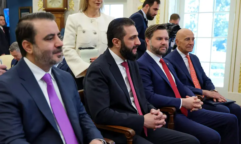 This handout photograph released by the Syrian Arab News Agency (SANA) on Nov 10, 2025, shows Syria&rsquo;s President Ahmed al-Sharaa (2nd L) speaking to the US President (unseen), as Syria&rsquo;s Foreign Minister Asaad al-Shaibani (L), US Vice President JD Vance (2nd R) and US envoy for Syria Tom Barrak (R) listen on, at the White House in Washington DC. &mdash;  SANA via AFP