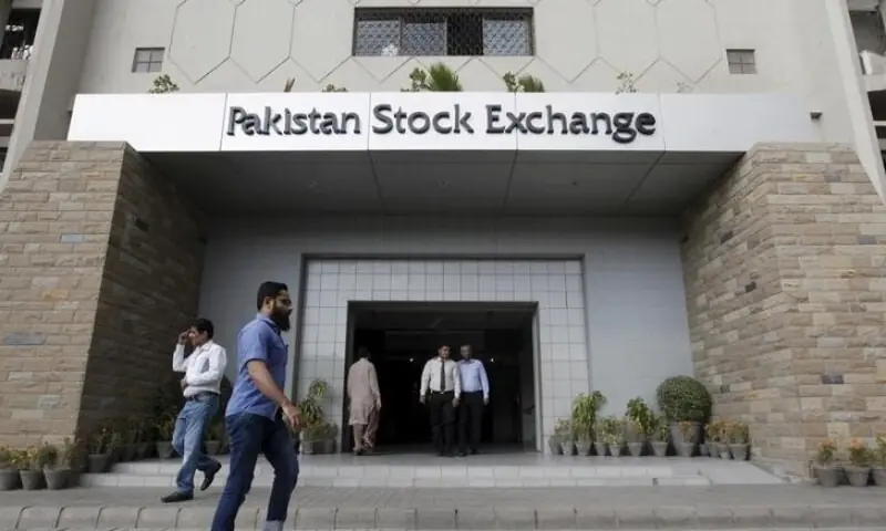 A man walks past the Pakistan Stock Exchange building. &mdash; Reuters/File