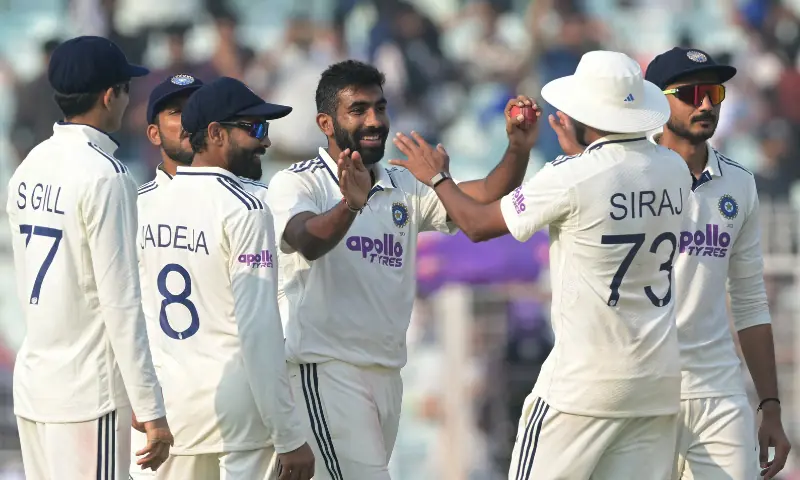India&rsquo;s Jasprit Bumrah (C) celebrates after taking five-wicket haul during the first day of the first Test cricket match between India and South Africa at the Eden Gardens in Kolkata on November 14, 2025. &mdash; AFP