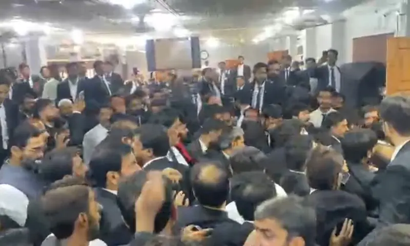 Scenes from commotion at the All Sindh Lawyers’ Convention in Sukkur on Saturday. — screengrab Scenes from commotion at the All Sindh Lawyers’ Convention in Sukkur on Saturday. — screengrab