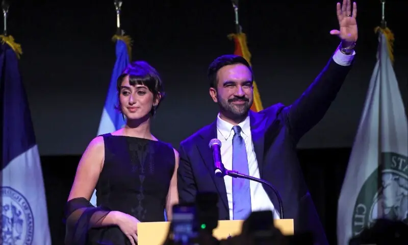 New York City Democratic mayoral candidate Zohran Mamdani waves with his wife Rama Duwaji (L) after delivering remarks at his election night watch party at the Brooklyn Paramount on November 4, 2025 in the Brooklyn borough of New York City. Mamdani defeated Independent candidate Andrew Cuomo and Republican candidate Curtis Sliwa in the closely watched election for New York City mayor. — Spencer Platt/ AFP via Getty New York City Democratic mayoral candidate Zohran Mamdani waves with his wife Rama Duwaji (L) after delivering remarks at his election night watch party at the Brooklyn Paramount on November 4, 2025 in the Brooklyn borough of New York City. Mamdani defeated Independent candidate Andrew Cuomo and Republican candidate Curtis Sliwa in the closely watched election for New York City mayor. — Spencer Platt/ AFP via Getty