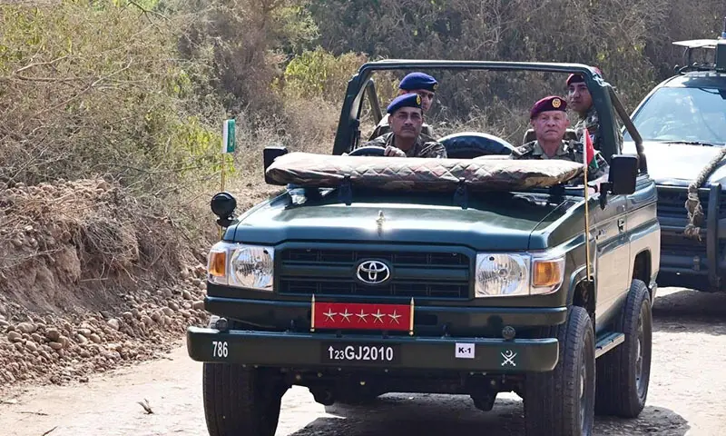 Chief of Army Staff Field Marshal Asim Munir drives in a jeep with King Abdullah II of Jordan at the Tilla Field firing ranges on November 16. &mdash; Photo courtesy ISPR