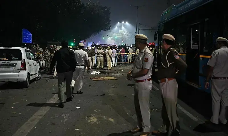 Security personnel gather at the site of an explosion near the Red Fort in the old quarters of New Delhi, India on November 10. &mdash; AFP/File