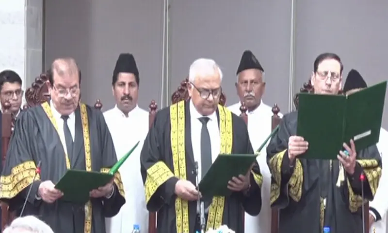 Justice Aminuddin Khan administers the oath to Justice Rozi Khan Barrech and Justice (retd) Arshad Hussain Shah at IHC on Monday. — DawnNewsTV Justice Aminuddin Khan administers the oath to Justice Rozi Khan Barrech and Justice (retd) Arshad Hussain Shah at IHC on Monday. — DawnNewsTV