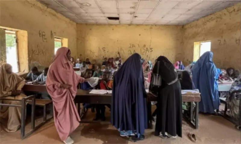 Students stand in a classroom in Shehu Kangiwa Model Primary School in Argungu, Kebbi State, in northern Nigeria, on April 12, 2025. — AFP/ Leslie Fauvel Students stand in a classroom in Shehu Kangiwa Model Primary School in Argungu, Kebbi State, in northern Nigeria, on April 12, 2025. — AFP/ Leslie Fauvel