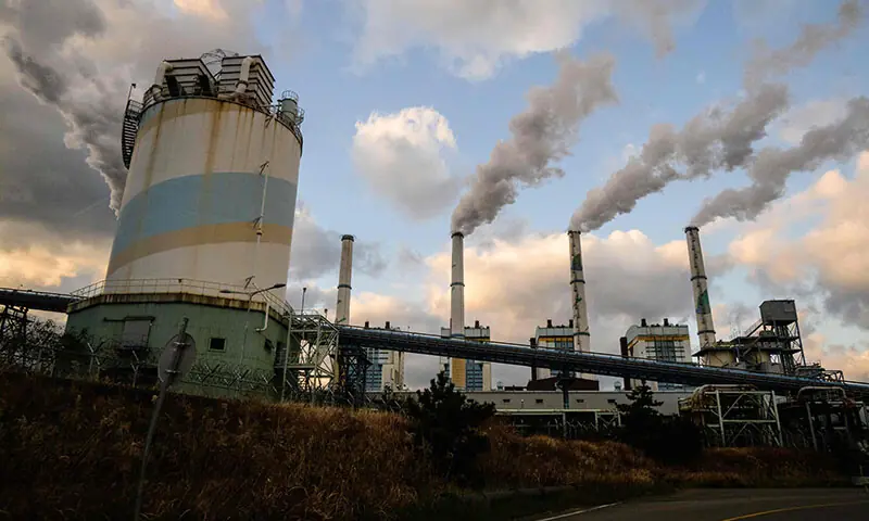 A general view shows exhaust gases billowing from the chimneys of the Taean Thermal Power Station, a large coal-fired power station owned by Korean Western Power Co, in Taean, around 150 kilometres from Seoul, South Korea on November 17. &mdash; AFP
