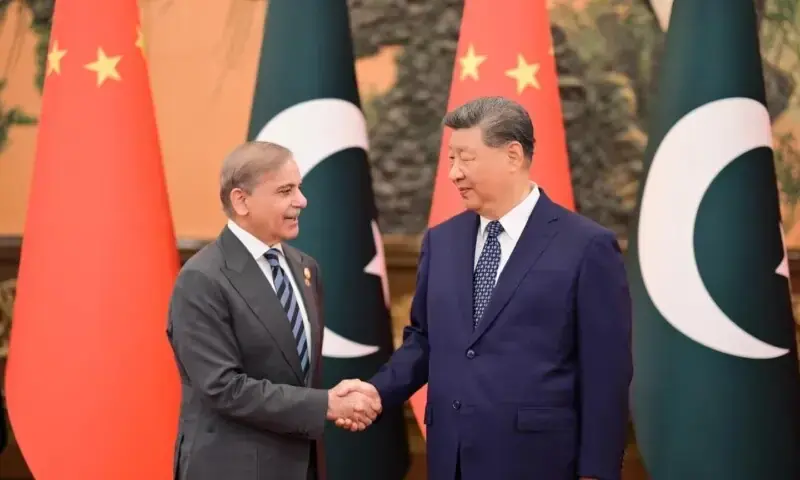 Prime Minister Shehbaz Sharif (l) shaking hands with Chinese President Xi Jinping on September 2, 2025, at the Great Hall of the People during the sidelines of the Shanghai Cooperation Organisation (SCO) Council of Heads of State (CHS) summit. &mdash; PID/File