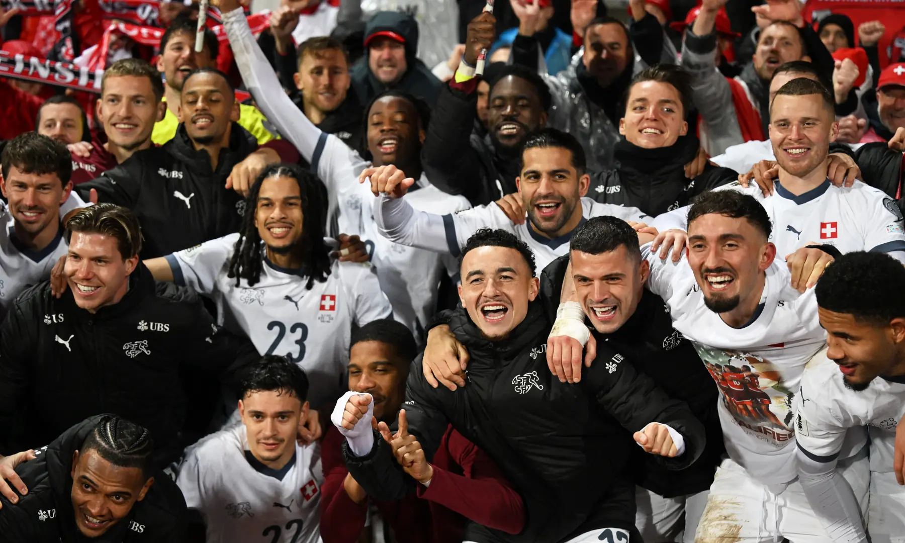 Switzerland’s players celebrate their qualification after the FIFA World Cup 2026 European qualification Group B football between Kosovo and Switzerland at the Fadil Vokrri Stadium in Pristina, on November 18, 2025. — AFP
