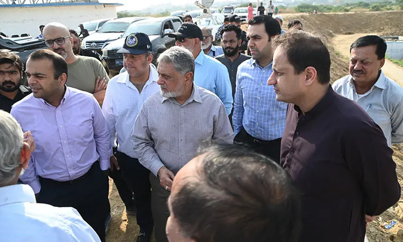 Karachi Mayor Murtaza Wahab (R) meets with industrialists about a project to treat and recycle sewerage for industrial use in Karachi on November 19. &mdash; Photo via author