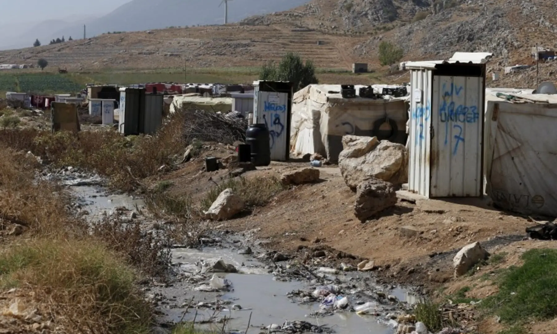 Toilets donated by Unicef and World Vision stand near tents at a Syrian refugee settlement camp in Qab Elias in the Bekaa Valley, near Baalbek, Lebanon, on October 17, 2015. — Reuters