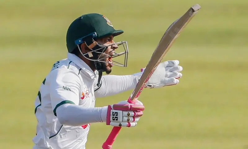Bangladesh’s Mushfiqur Rahim celebrates after scoring a century (100 runs) during the second day of the second Test cricket match between Bangladesh and Ireland at the Sher-e-Bangla National Cricket Stadium in Dhaka on November 20, 2025. —AFP