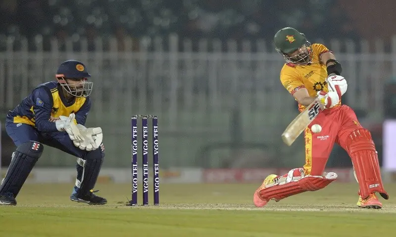 Zimbawe captain Sikandar Raza plays a shot as Sri Lankan wicket-keeper Kusal Mendis looks on during the tri-series match at the Rawalpindi Cricket Stadium on November 20, 2025.&mdash;Tanveer Shahzad/White Star