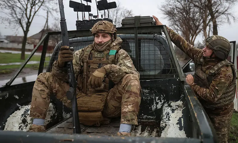 A serviceman of the 93rd Kholodnyi Yar Separate Mechanised Brigade of the Ukrainian Armed Forces sits in a pickup truck  near the frontline town of Kostiantynivka in Donetsk region, Ukraine, November 20, 2025. REUTERS/Anatolii Stepanov