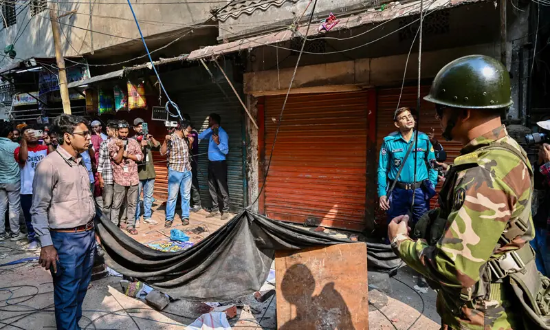 An army personnel stands guard near the rubble that fell from a damaged building following an earthquake in Old Dhaka on November 21, 2025. — AFP An army personnel stands guard near the rubble that fell from a damaged building following an earthquake in Old Dhaka on November 21, 2025. — AFP