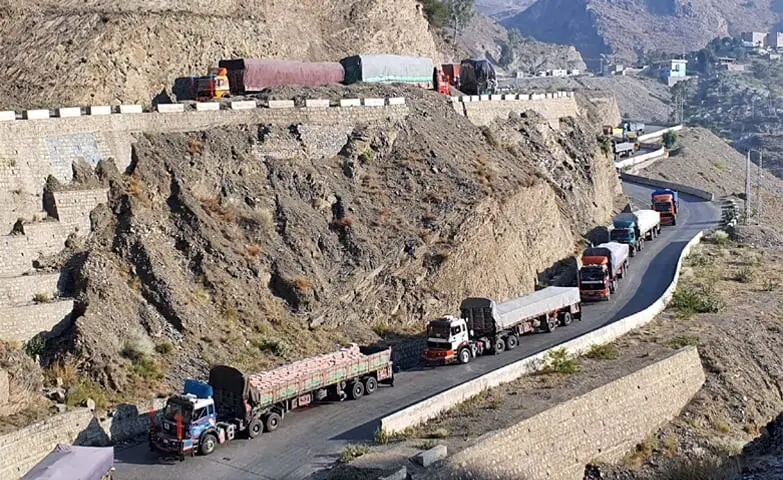 A LARGE number of trucks loaded with goods stand in a queue as they await the reopening of the Pak-Afghan Torkham border, in Landi Kotal.&mdash;PPI/File