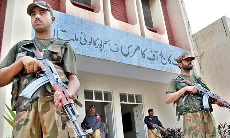 Pakistan Army personnel taking over the charge of the sensitive polling station at Government College of Commerce. — File photo by APP Pakistan Army personnel taking over the charge of the sensitive polling station at Government College of Commerce. — File photo by APP