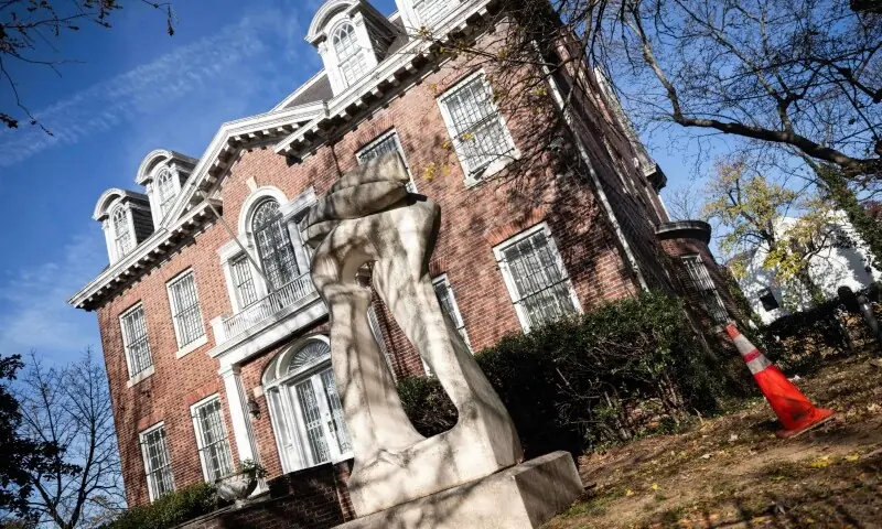 THE former Syrian embassy is seen behind locked gates in Washington.—AFP