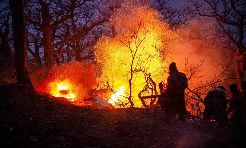 In this picture obtained from Iran&rsquo;s ISNA news agency, shows a view of the fire in the forests of Chalus, which has been going on for several days in Chalus on November 21, 2025. &mdash;AFP