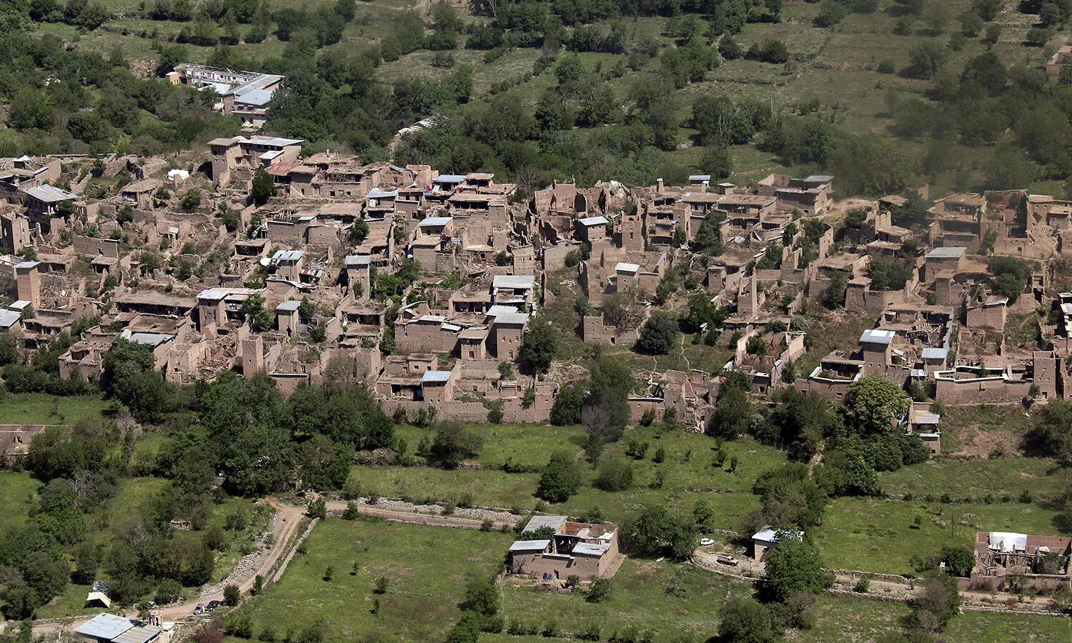 In this file photo taken from a Pakistani army helicopter, empty houses whose roofs have been removed by the army during an operation are seen in South Waziristan.&mdash; AFP