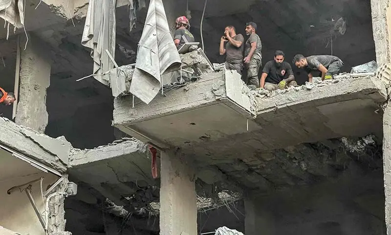 Rescuers search for survivors at the site of an Israeli air attack that targeted a residential building in Beirut&rsquo;s southern Haret Hreik neighbourhood in Lebanon on November 23. &mdash; AFP