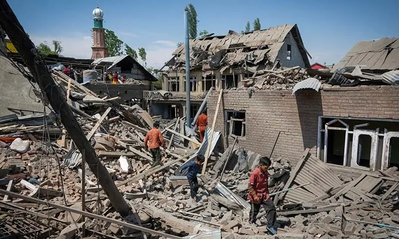 People walk through the rubble of the family house of Ehsan Ahmad Sheikh which was demolished by the Indian authorities at Murran village in Pulwama, occupied Kashmir on April 26, 2025. &mdash; Reuters/File
