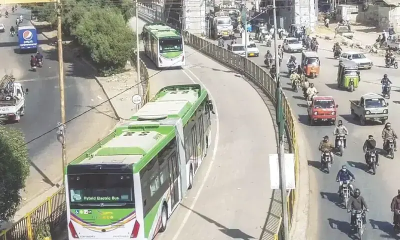 In this file photo, a couple of Green Line buses, part of an 80-strong fleet, pass through North Nazimabad for a test run on December 23, 2021. — Photo by Fahim Siddiqi / White Star/File In this file photo, a couple of Green Line buses, part of an 80-strong fleet, pass through North Nazimabad for a test run on December 23, 2021. — Photo by Fahim Siddiqi / White Star/File