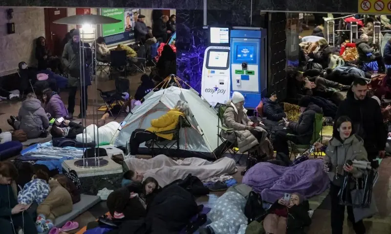 People take shelter inside a metro station during a Russian missile and drone strike in Kyiv, Ukraine, November 25. &mdash; Reuters