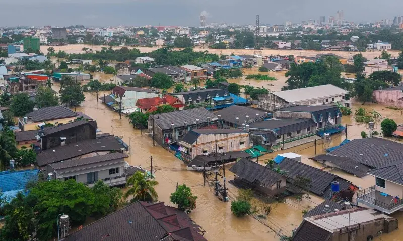 This aerial photo taken on November 26 shows flood waters surrounding residential buildings in Hat Yai in Thailand&rsquo;s southern Songkhla province, as severe flooding affected thousands of people.&mdash; AFP