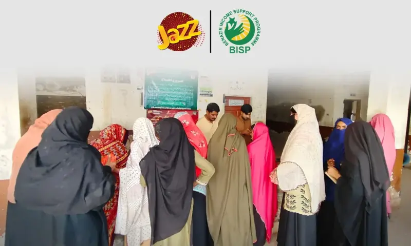 Women gather to receive free SIMs under the Benazir Income Support Programme (BISP). &mdash; APP