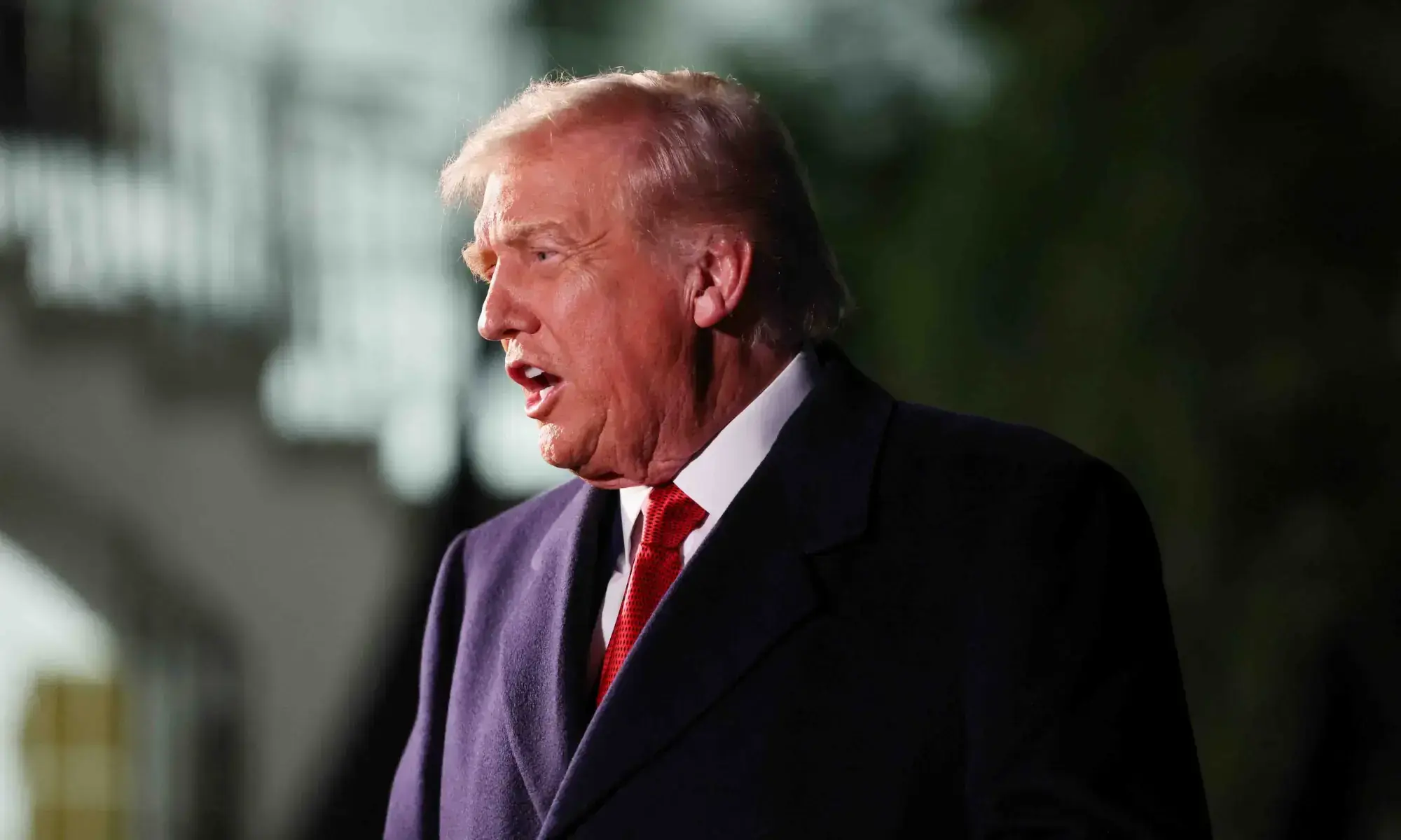 US President Donald Trump speaks to members of the media (not pictured) as he departs for Asia from the South Lawn of the White House in Washington, DC on October 24. &mdash; Reuters