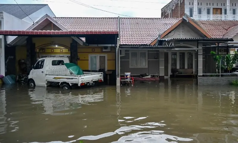 Flooded houses are seen following heavy rain at a residential area of Darul Imarah on the outskirts of Banda Aceh on November 27, 2025. — AFP