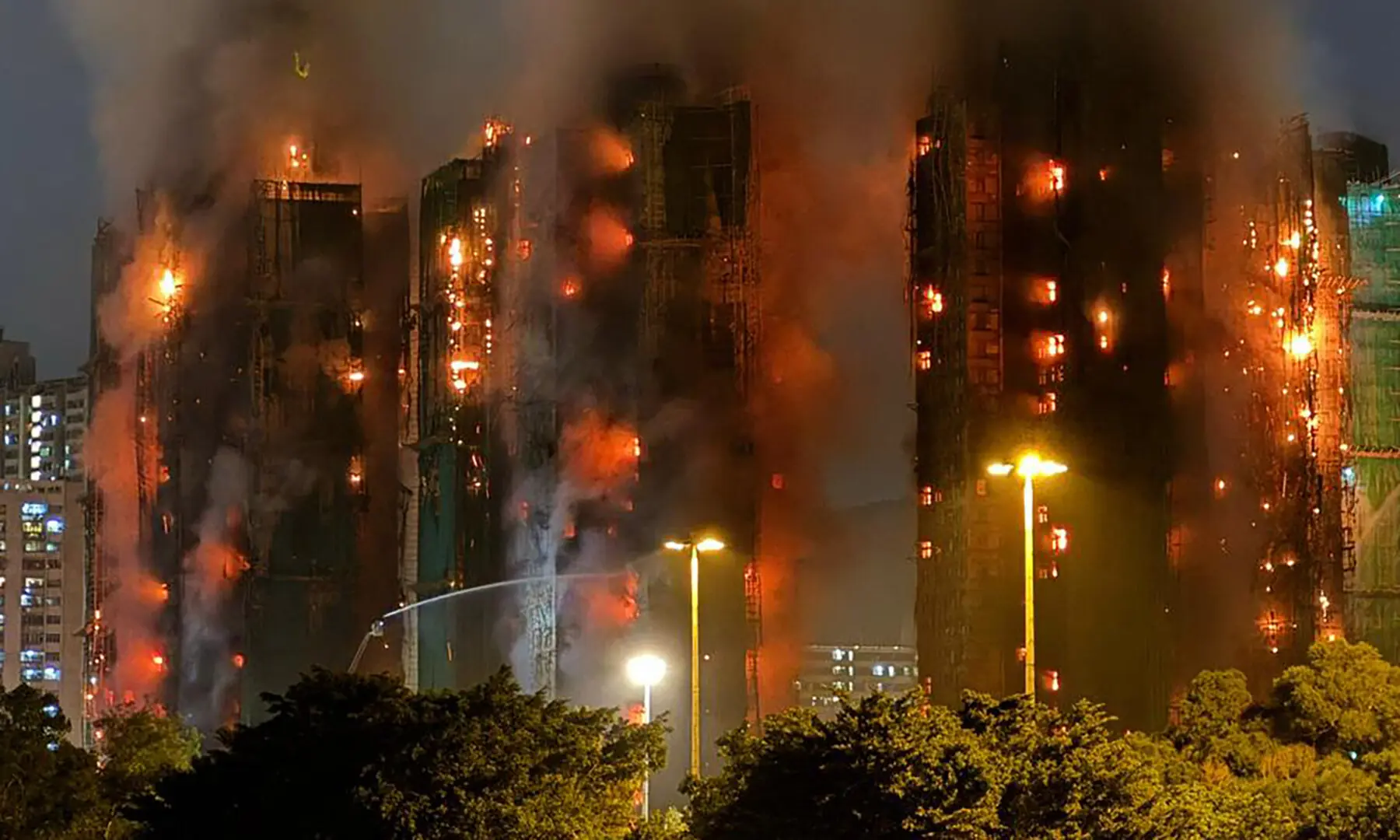 Thick smoke and flames rise as a major fire engulfs several apartment blocks at the Wang Fuk Court residential estate in Hong Kong&rsquo;s Tai Po district on November 26, 2025. &mdash; AFP