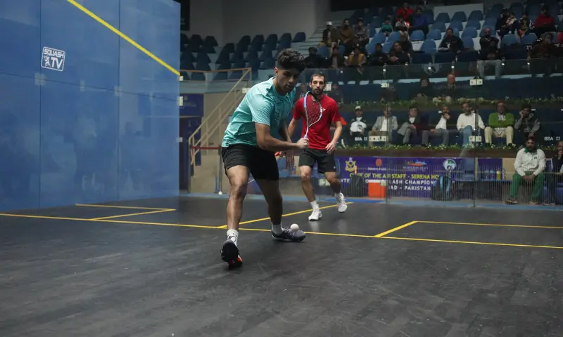 Pakistan&rsquo;s Noor Zaman plays against compatriot Nasir Iqbal in the CAS-Serena Hotels International Squash Championship at the Mushaf Squash Complex on Thursday. &mdash; Photo via Pakistan Squash Federation