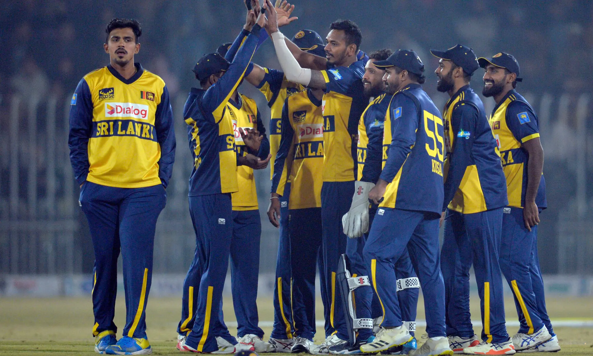 Sri Lankan players celebrate taking a wicket during the Twenty20 International tri-series match against Pakistan at the Rawalpindi Cricket Stadium on November 27, 2025.&mdash;Tanveer Shahzad/White Star