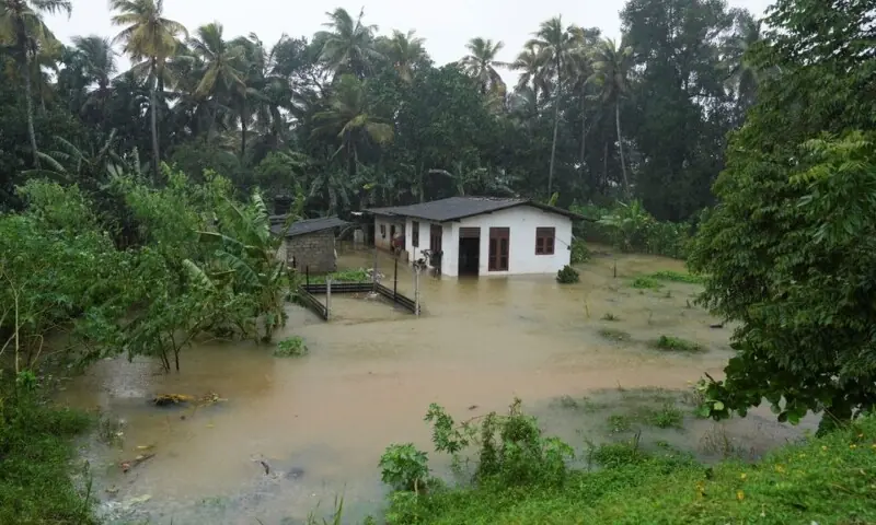 A house stands partially submerged following heavy rainfall in Kelaniya, Sri Lanka, on November 28. &mdash; Reuters