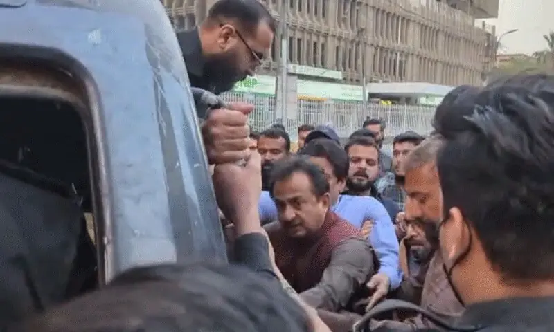 PTI leaders detained by Karachi police from outside Karachi Press Club on Friday. — DawnNewsTV PTI leaders detained by Karachi police from outside Karachi Press Club on Friday. — DawnNewsTV