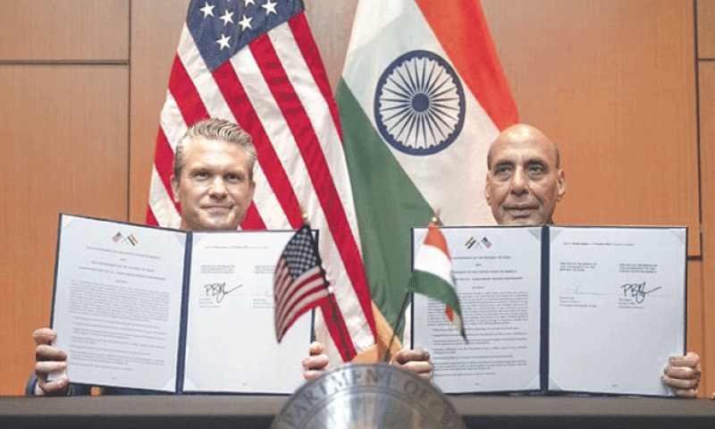 KUALA LUMPUR: Indian Defence Minister Rajnath Singh and his American counterpart Peter Hegseth hold up the signed defence framework deal.&mdash;X/@SecWar
