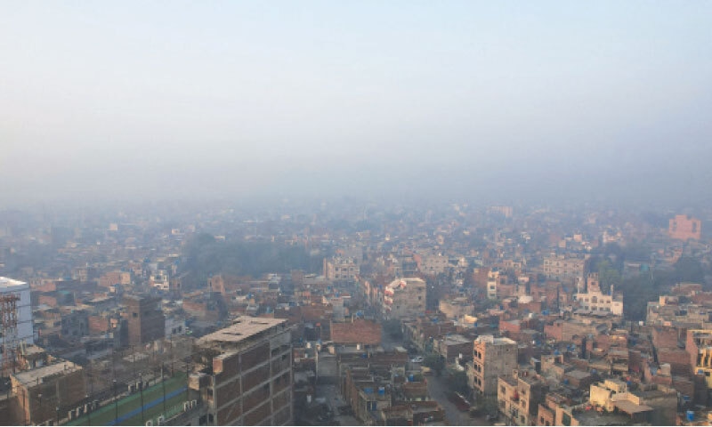 A smoggy view at Badami Bagh early in the morning on Monday. — White Star / M. Arif A smoggy view at Badami Bagh early in the morning on Monday. — White Star / M. Arif