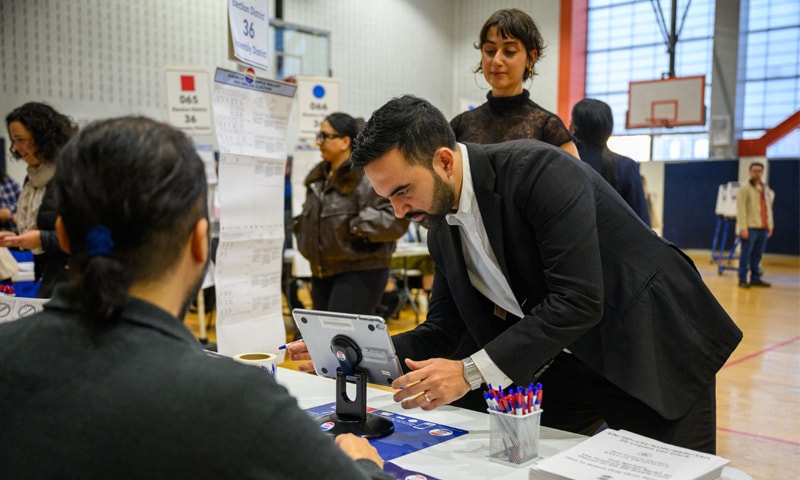 NEW YORK CITY: Democratic mayoral candidate Zohran Mamdani and his wife Rama Duwaji cast their votes at the Frank Sinatra School of the Arts in Queens.&mdash;AFP