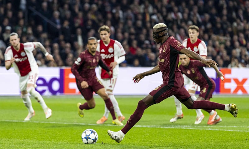 AMSTERDAM: Galatasaray&rsquo;s Victor Osimhen shoots to score from the penalty spot during the match against Ajax at the Johan Cruyff Arena.&mdash;AFP