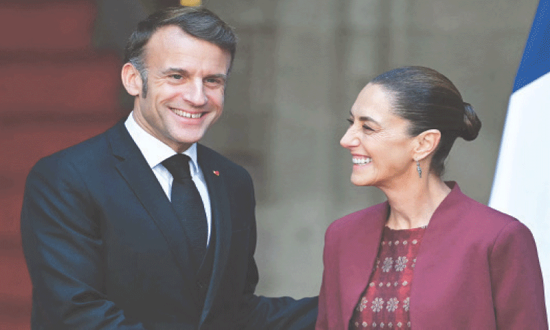 FRANCE&rsquo;S President Emmanuel Macron with Mexican counterpart Claudia Sheinbaum during a ceremony in Mexico City.&mdash;AFP