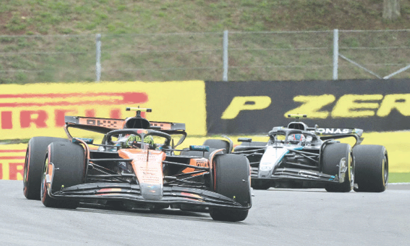 SAO PAULO: McLaren’s British driver Lando Norris (L) races ahead of Mercedes’ Kimi Antonelli of Italy during the sprint of the
Sao Paulo Formula One Grand Prix at the Jose Carlos Pace racetrack on Saturday.—AFP SAO PAULO: McLaren’s British driver Lando Norris (L) races ahead of Mercedes’ Kimi Antonelli of Italy during the sprint of the
Sao Paulo Formula One Grand Prix at the Jose Carlos Pace racetrack on Saturday.—AFP