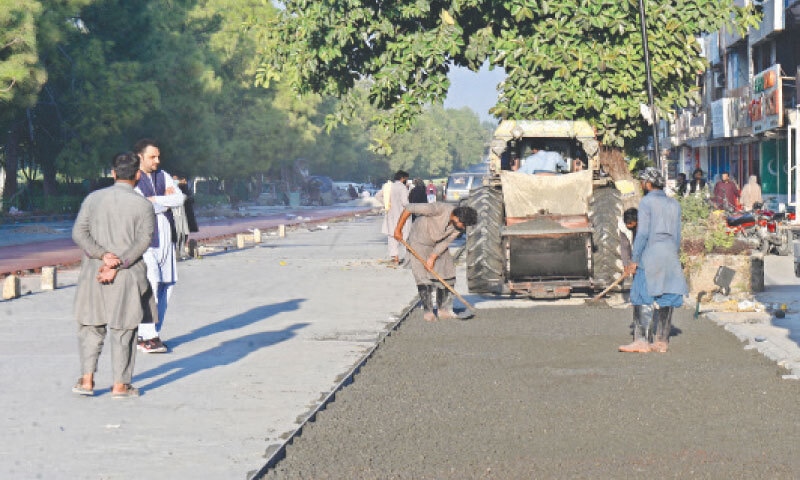 Work under way on a car-free pedestrian zone in Islamabad’s Blue Area. — White Star Work under way on a car-free pedestrian zone in Islamabad’s Blue Area. — White Star
