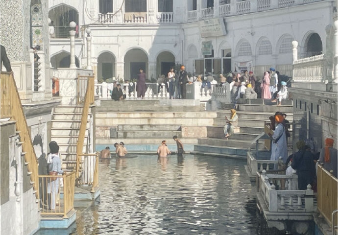 Devotees take a ritual bath in the holy pond known as ‘Ashnan’.