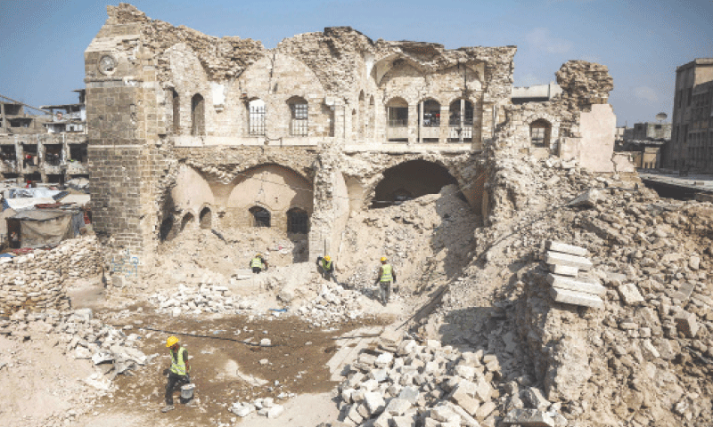 Workers start the rehabilitation on what remains of the Pasha&rsquo;s Palace, destroyed by the Israeli military and which once housed 40,000 artifacts representing the succession of civilisations in the region, in Gaza City.&mdash;AFP