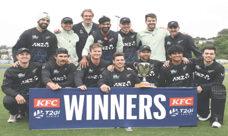 NEW ZEALAND cricketers pose with the series trophy after defeating West Indies in the fifth Twenty20 International at the University of Otago Oval on Thursday.&mdash;AFP