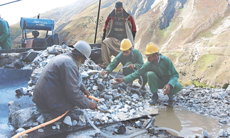 Labourers wash rocks outside a mine in the Chitta Katha mountains, Azad Kashmir. A US-based firm has expressed interest in joint ventures and feasibility studies for high-value minerals across Pakistan.—AFP/file Labourers wash rocks outside a mine in the Chitta Katha mountains, Azad Kashmir. A US-based firm has expressed interest in joint ventures and feasibility studies for high-value minerals across Pakistan.—AFP/file