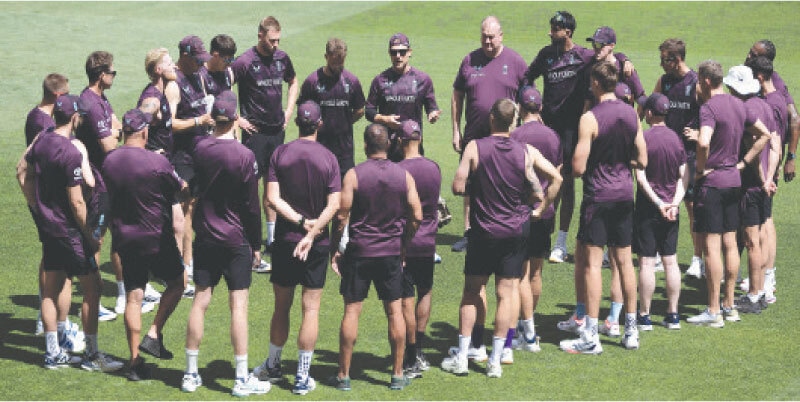 PERTH: England coach Brendon McCullum (C) addresses the players before a practice session at the Optus Stadium on Wednesday.—AFP