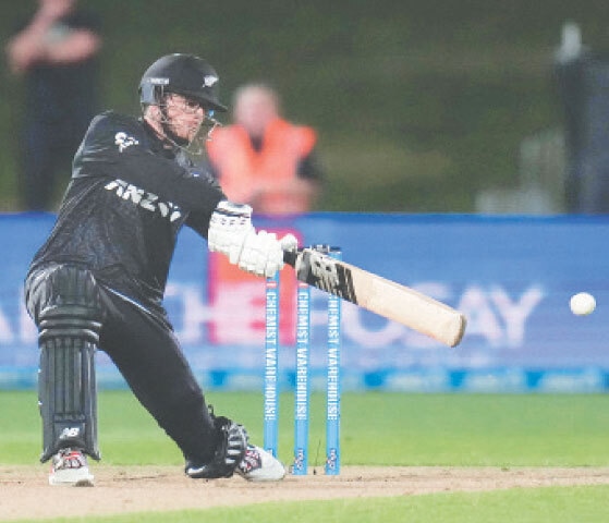 NEW ZEALAND captain Mitchell Santner plays a shot during the second One-day International against West Indies at the McLean Park on Wednesday.—AFP