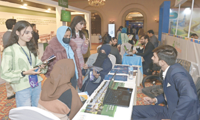 Students visit a stall on the concluding day of Dawn Education Expo at Serena Hotel in Islamabad on Thursday. &mdash; Photo by Mohammad Asim